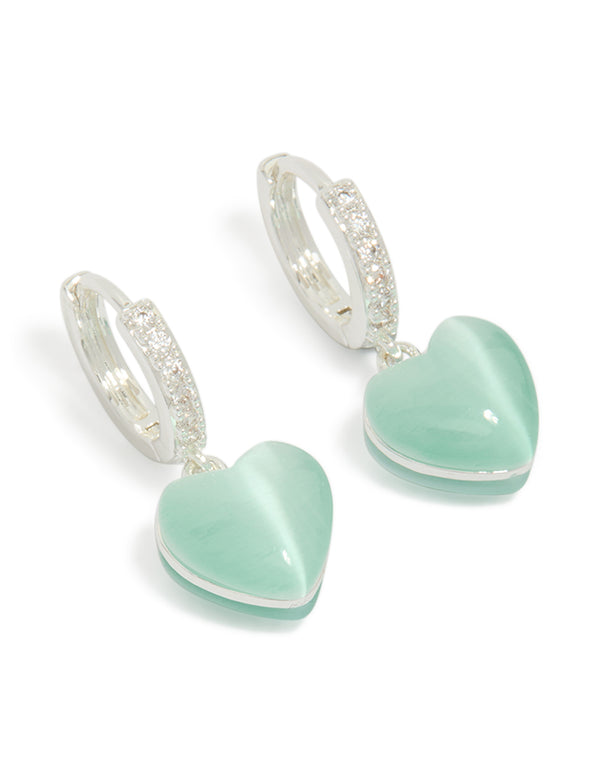 Discover silver plated pave blue heart drop earrings with a hoop closure in pale turquoise front view