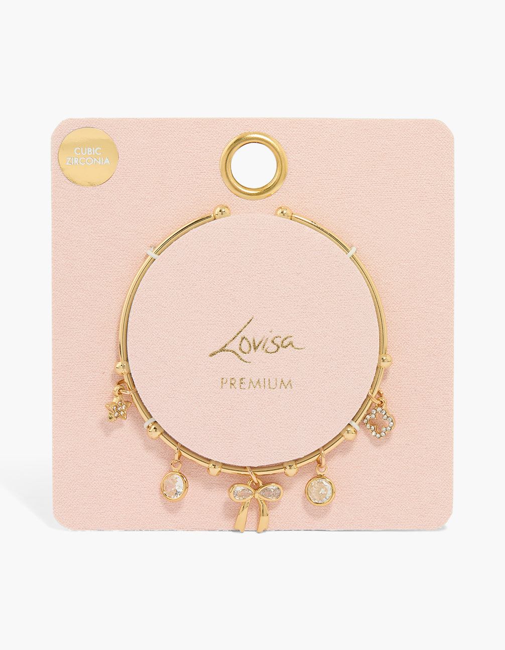 Elegantly styled gold plated wrist cuff with bow, floral and star charm featuring cubic zirconia, shown in a gift packaging close up view