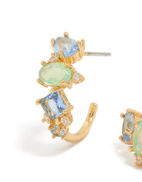 Showcasing gold plated blue and green cubic zirconia multi-shaped hoop earrings with sky blue and pale green stones in close up view - link has visual effect only