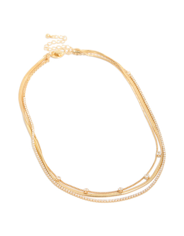 Experience the elegance of this gold plated cubic zirconia tennis snake chain triple layered necklace front view