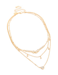 Featuring a gold plated cubic zirconia tennis and pendant layered necklace with charm in dainty style front view - link has visual effect only
