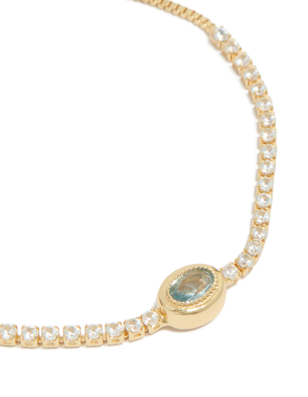 Detailed view of gold plated cubic zirconia oval bezel toggle bracelet close up view