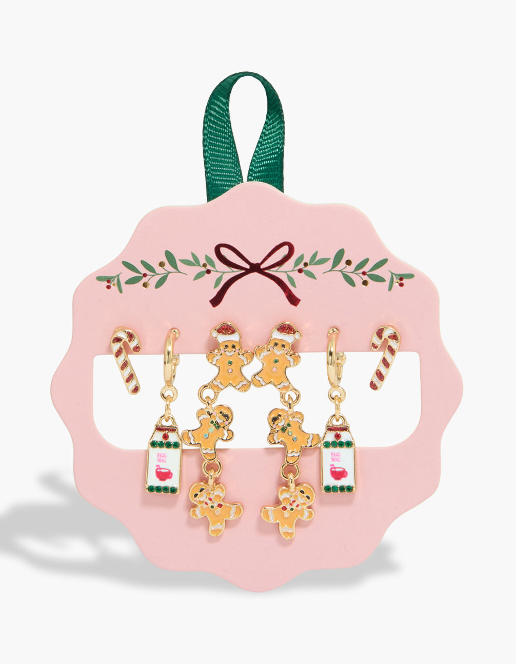 Showcasing statement stud and hoop earrings in a 3-pack featuring with food and drink Gingerbread Men & Milk, displayed in gold front view