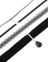 Showcasing a black lace and teardrop choker necklaces 4-pack with pearl accents in silver and clear close up view - link has visual effect only