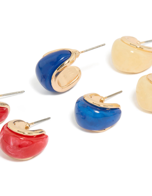 Crafted from acrylic, these bubble hoop earrings feature gold, red, and royal blue tones in a 3-pack close up view