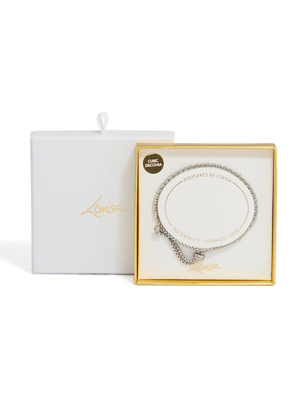 Crafted from waterproof stainless steel cubic zirconia tennis toggle bracelet in silver and clear with packaging close up view