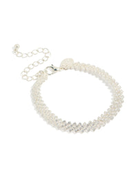 Showcasing a diagonal round cubic zirconia bracelet crafted from silver plated material front view - link has visual effect only