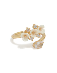 Beautifully crafted gold plated triple flower wrap ring featuring floral design with ivory and white statement front view - link has visual effect only