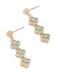 Showcasing these gold cubic zirconia blue flower drop earrings with turquoise stones front view - link has visual effect only