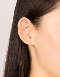 Crafted from surgical steel this cubic zirconia wave crawler single flat back stud in silver and clear on ear view - link has visual effect only
