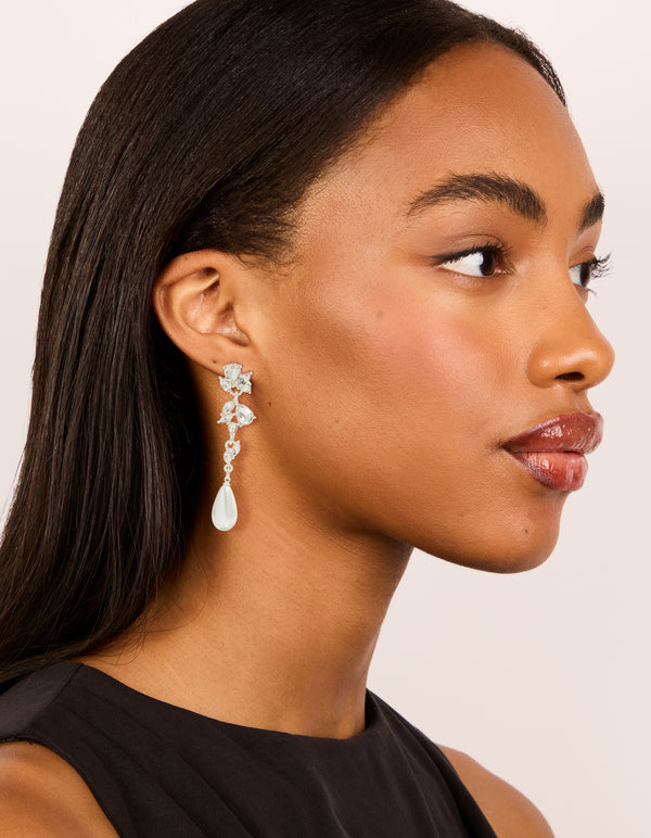 Beautiful silver pearl and crystal leaf drop earrings on model view