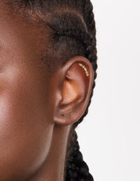 Elegant crawler stud earring featuring marquise cut cubic zirconia in gold plated titanium with flat back closure on ear view - link has visual effect only
