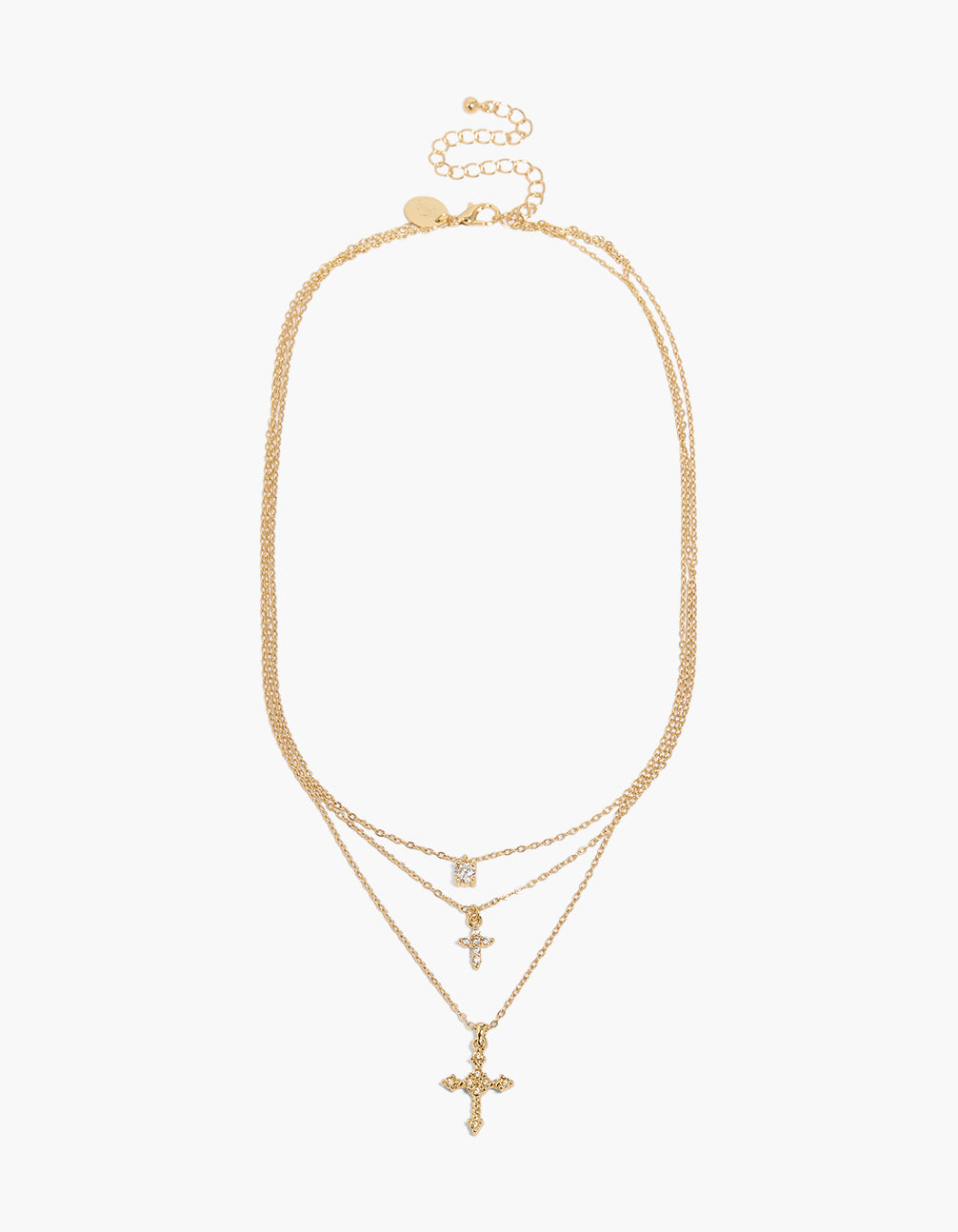 Elegant gold plated layered necklace featuring cross cubic zirconia and crystal accents clasp detail front view