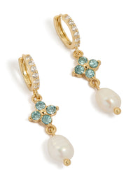 Beautifully crafted gold plated drop earrings featuring blue diamante with freshwater pearls front view - link has visual effect only