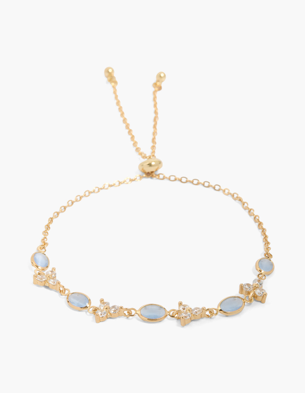 Showcasing a gold plated triple flower toggle bracelet featuring floral design with blue cubic zirconia in oval stone front view