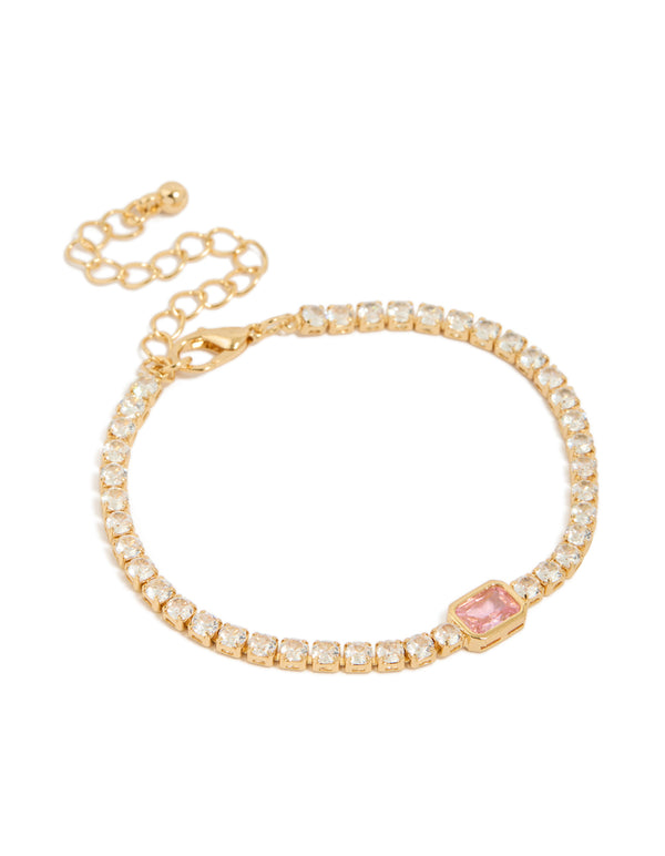 Showcasing a gold plated pink cubic zirconia baguette tennis bracelet with crystal accents front view