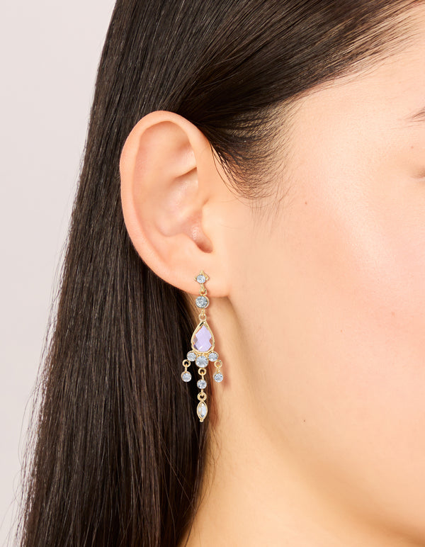 Showcasing gold plated pink cubic zirconia drop detail earrings featuring charm on ear view
