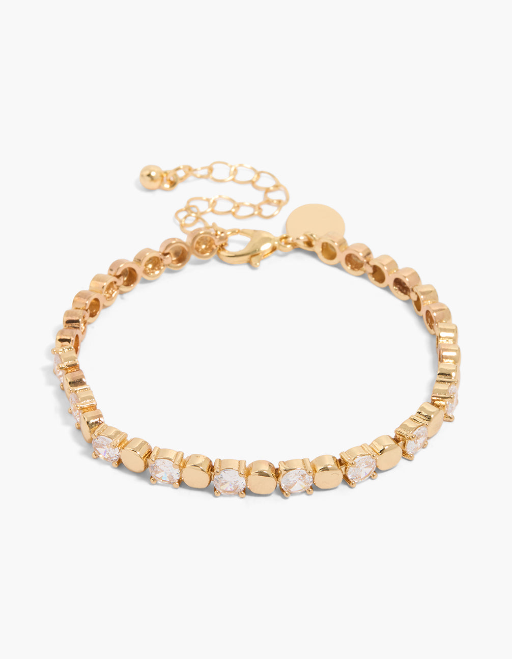 Featuring a gold plated alternating ball cubic zirconia bracelet in statement style front view