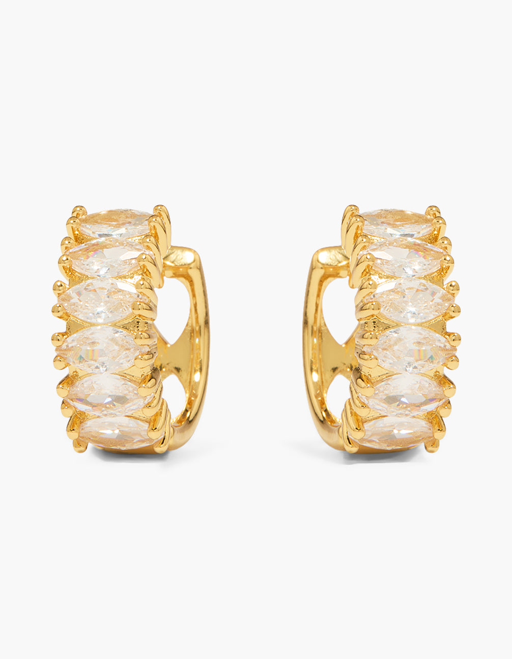 Showcasing gold plated oval cubic zirconia huggie earrings in clear front view