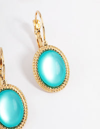 Gold Oval Huggie Earrings - link has visual effect only
